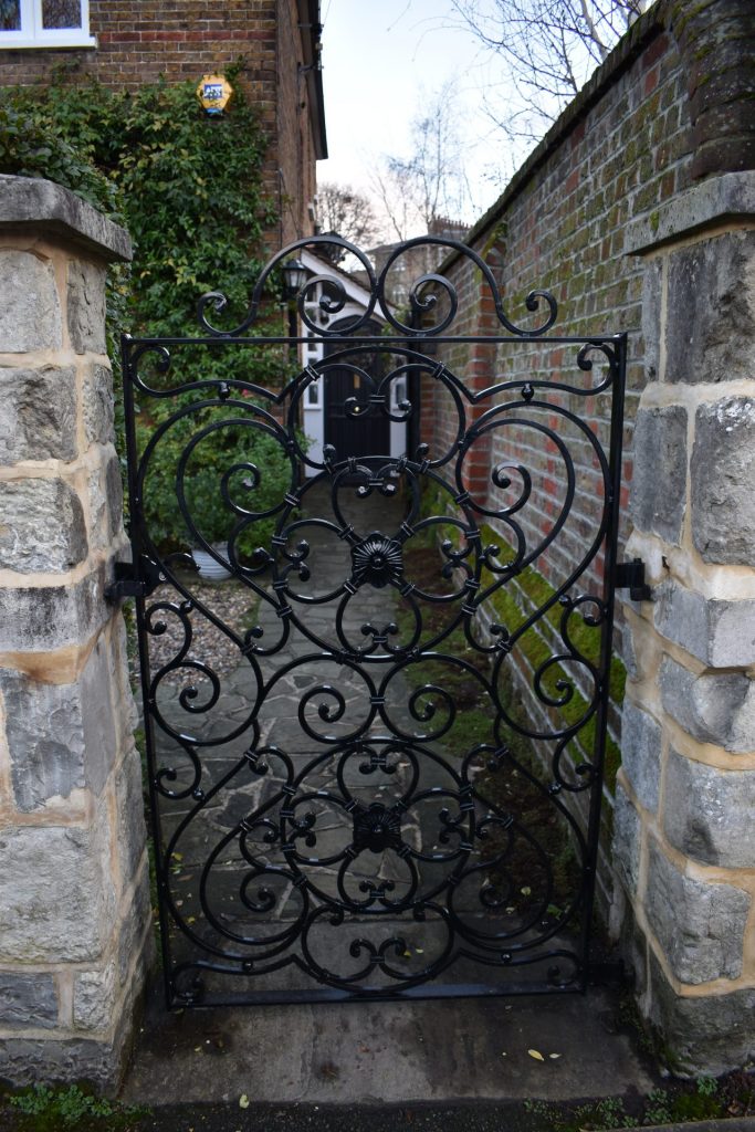 Bespoke wrought iron pedestrian gate at a property in Windsor.