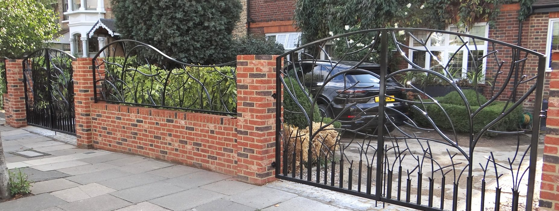 Bespoke wrought iron gates made and fitted by The Blacksmith Shop.