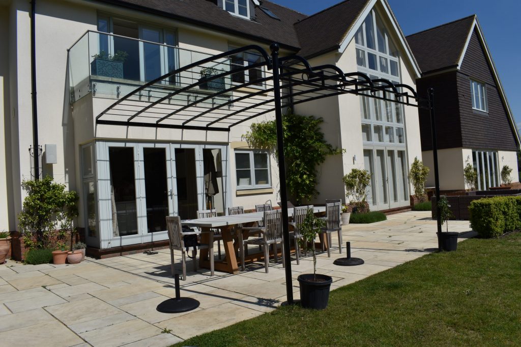 This bespoke pergola is a great addition the patio area.