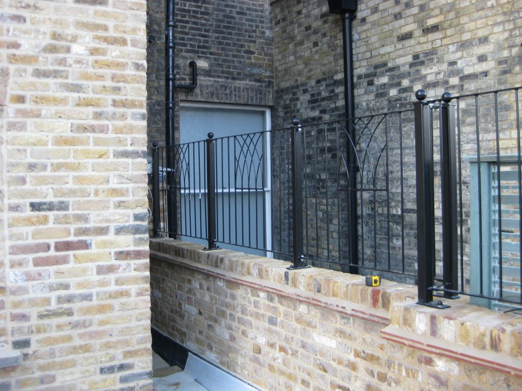 Custom-made parapet railings providing security and safety.
