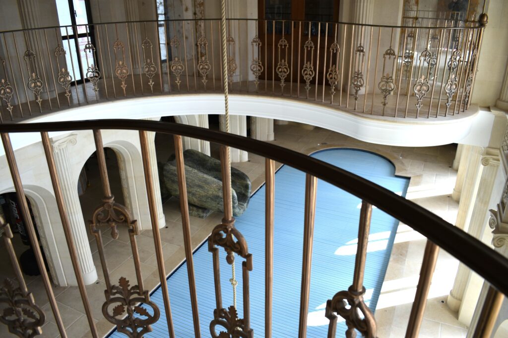Stunning detail of bronze balustrade and handrail made and fitted by The Blacksmith Shop.