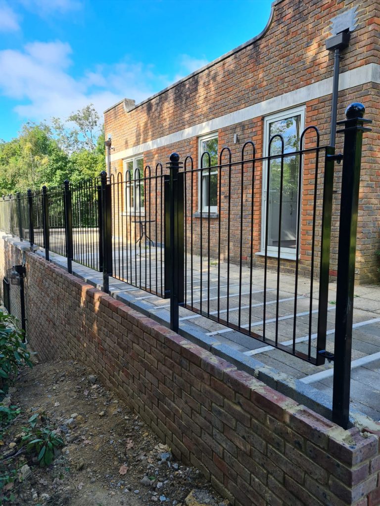Bespoke metal fence rails fitted at a property in Seer Green.