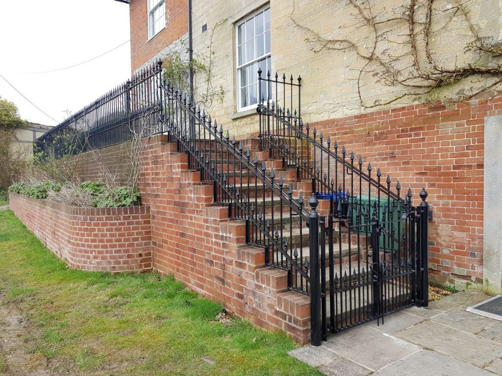 Bespoke wrought iron balustrades and gates made by The Blacksmith Shop and fitted in Royal Wootton Bassett.