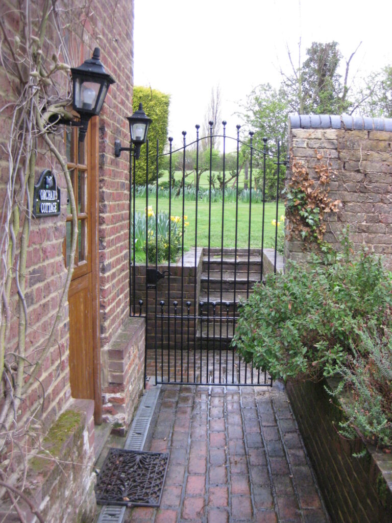 An attractive Austenwood wrought iron garden gate.